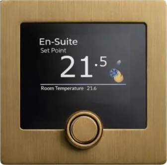 A Polar Bear Zentium thermostat in brushed brass, its screen reading En-Suite, set point 21.5