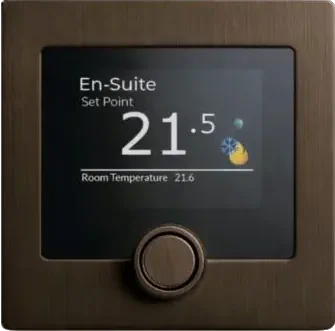 A Polar Bear Zentium thermostat in dark bronze, its screen reading En-Suite, set point 21.5