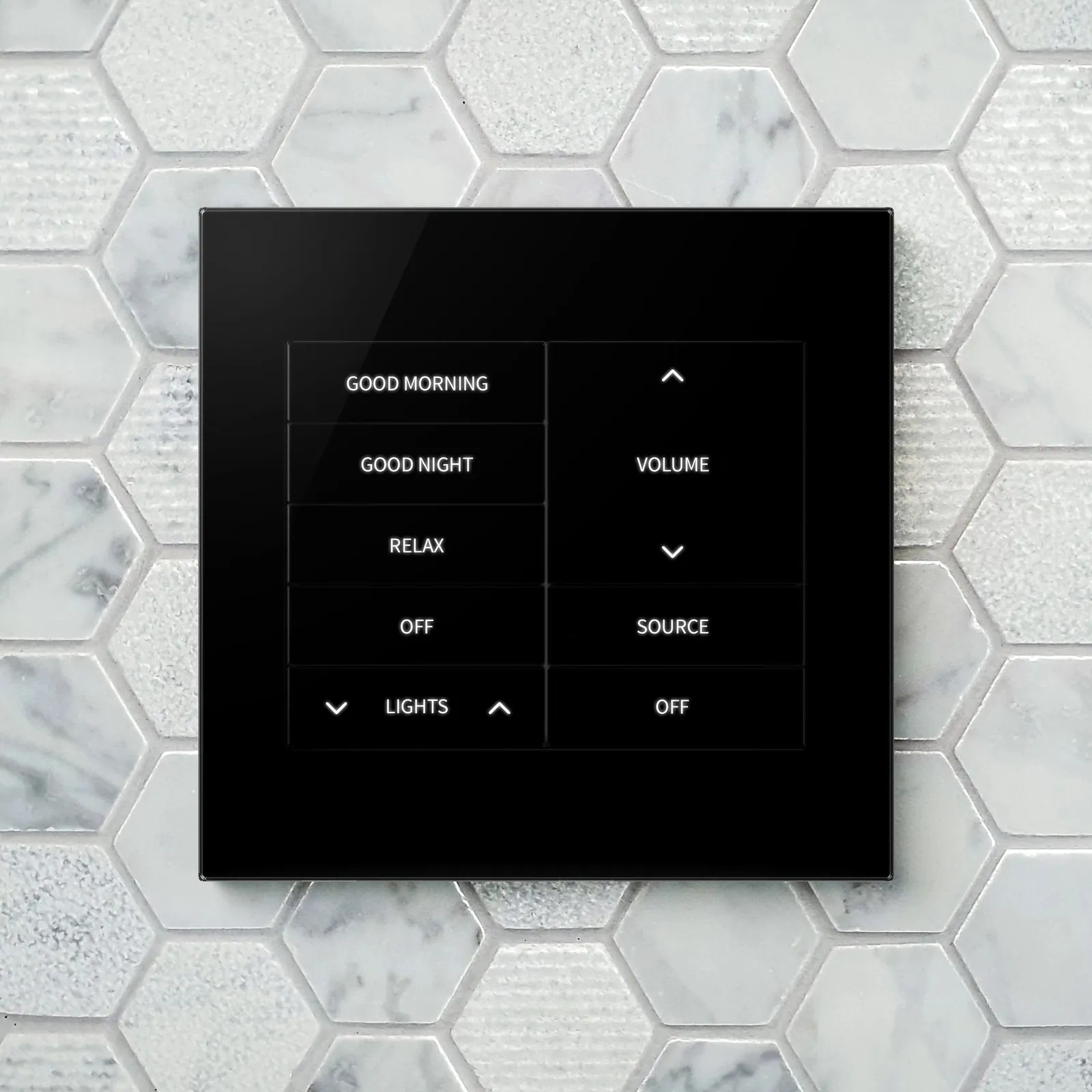 A double-width black glass keypad on a marble tile wall, with lighting scenes on the left and music volume and source on the right