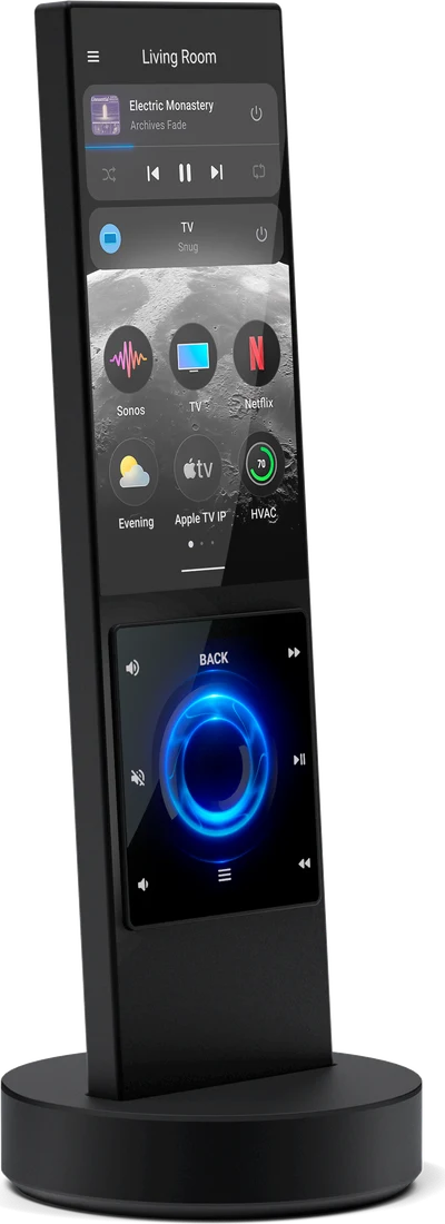A premium touchscreen handheld remote resting in its charging dock